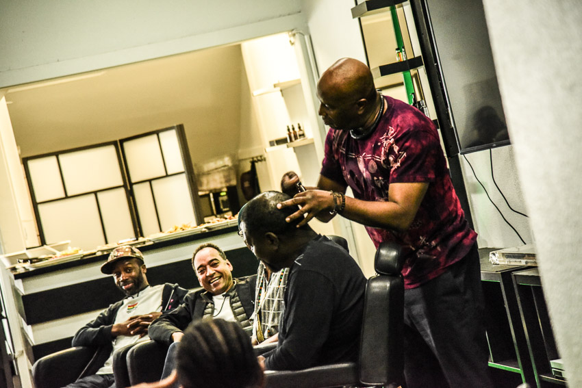 Leading up to the 2018 Barbershop Chronicles perfor- mance at UC Berkeley, a community forum was held at Benny Adem Grooming Parlor, presented by the Haas Insti- tute for a Fair and Inclusive Society, Benny Adem Grooming Parlor, Africanity Love, Priority 