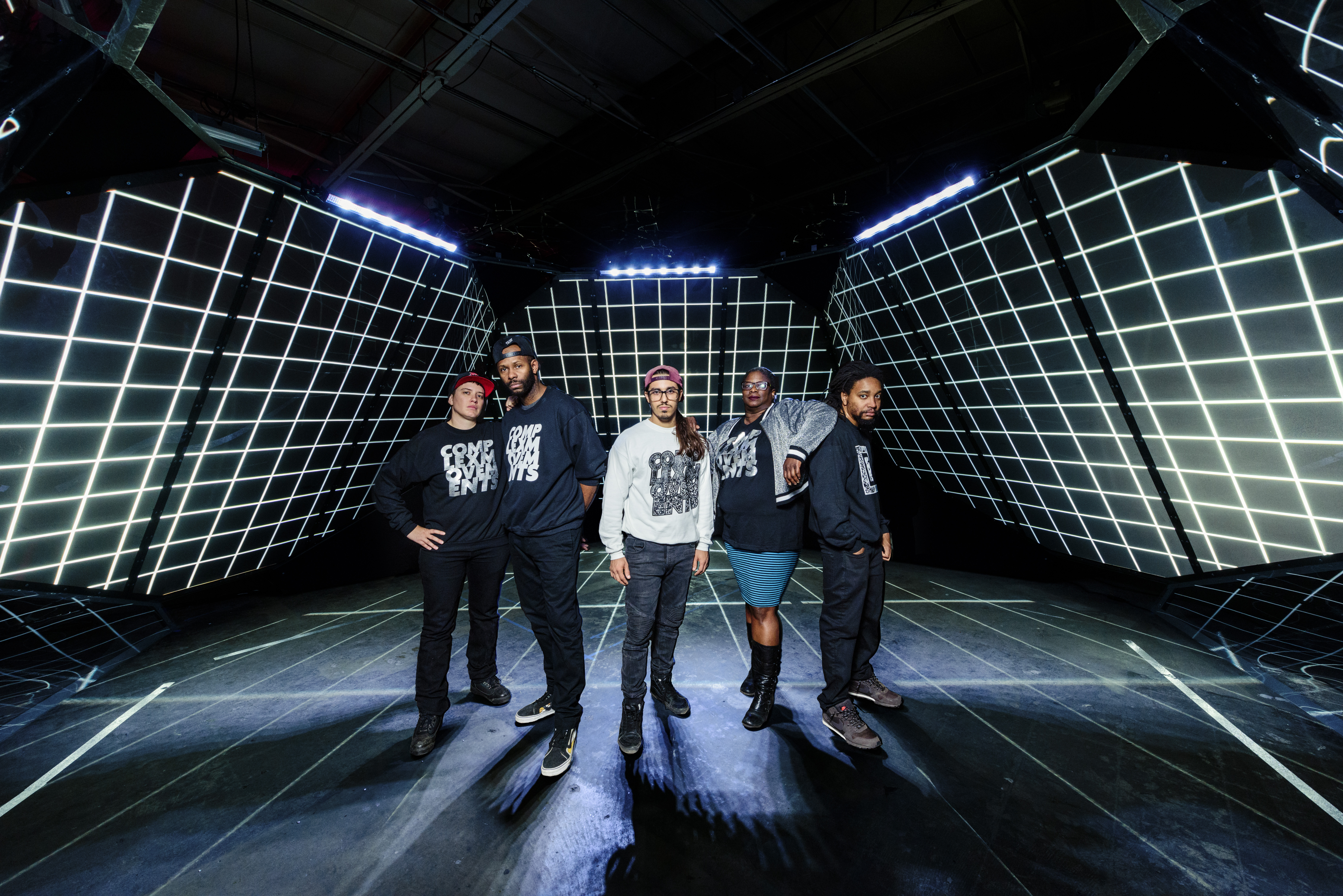 Five people standing in gridded dome: (L to R: ill Weaver/Invincible, Waajeed, L05/Carlos Garcia,_Sage Crump, Wesley Taylor). image credit: Doug Coombe
