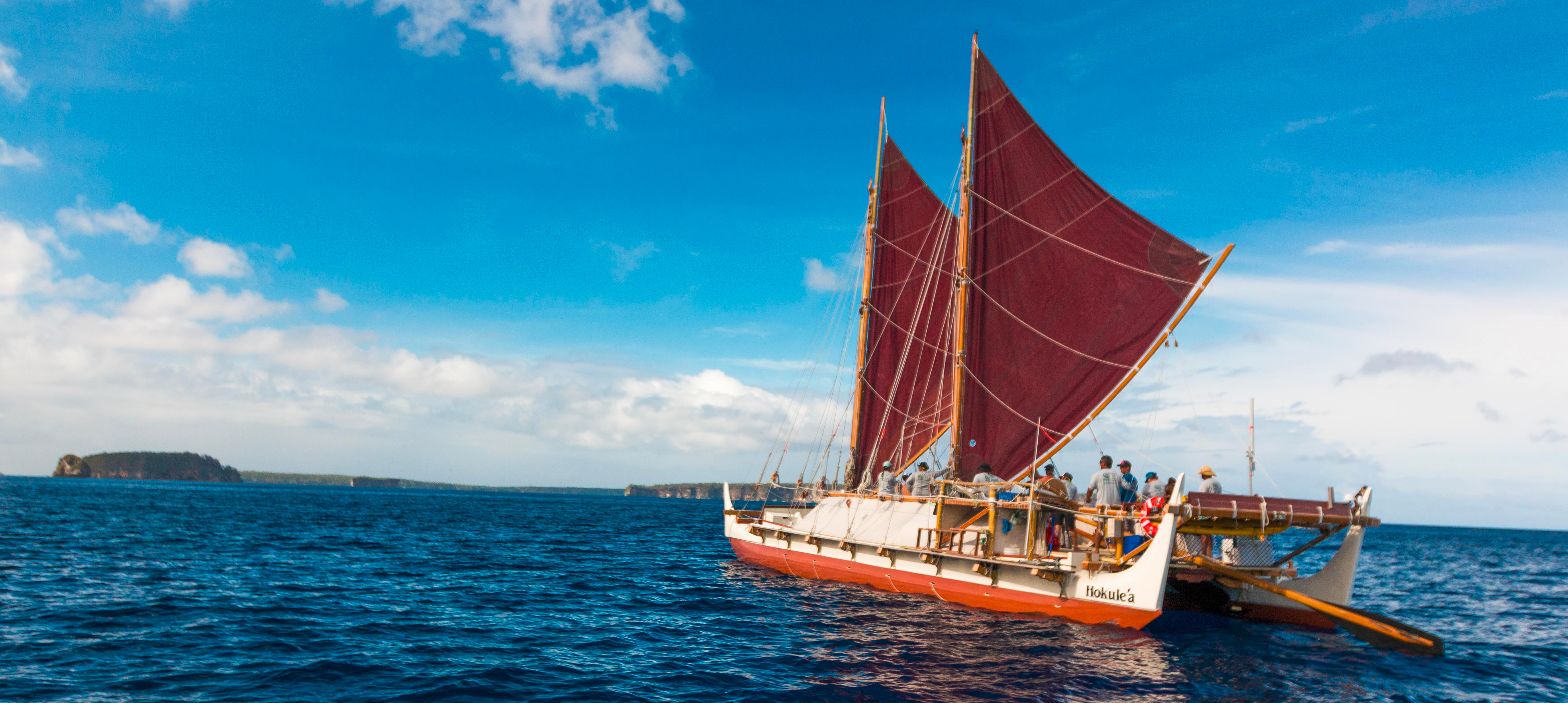 The Hōkūle‘a double-hulled voyaging canoe, which since its first launch in 1975, has sailed over 140,000 nautical miles. Courtesy Polynesian Voyaging Society. Photo by ʻŌiwi TV. 2015.