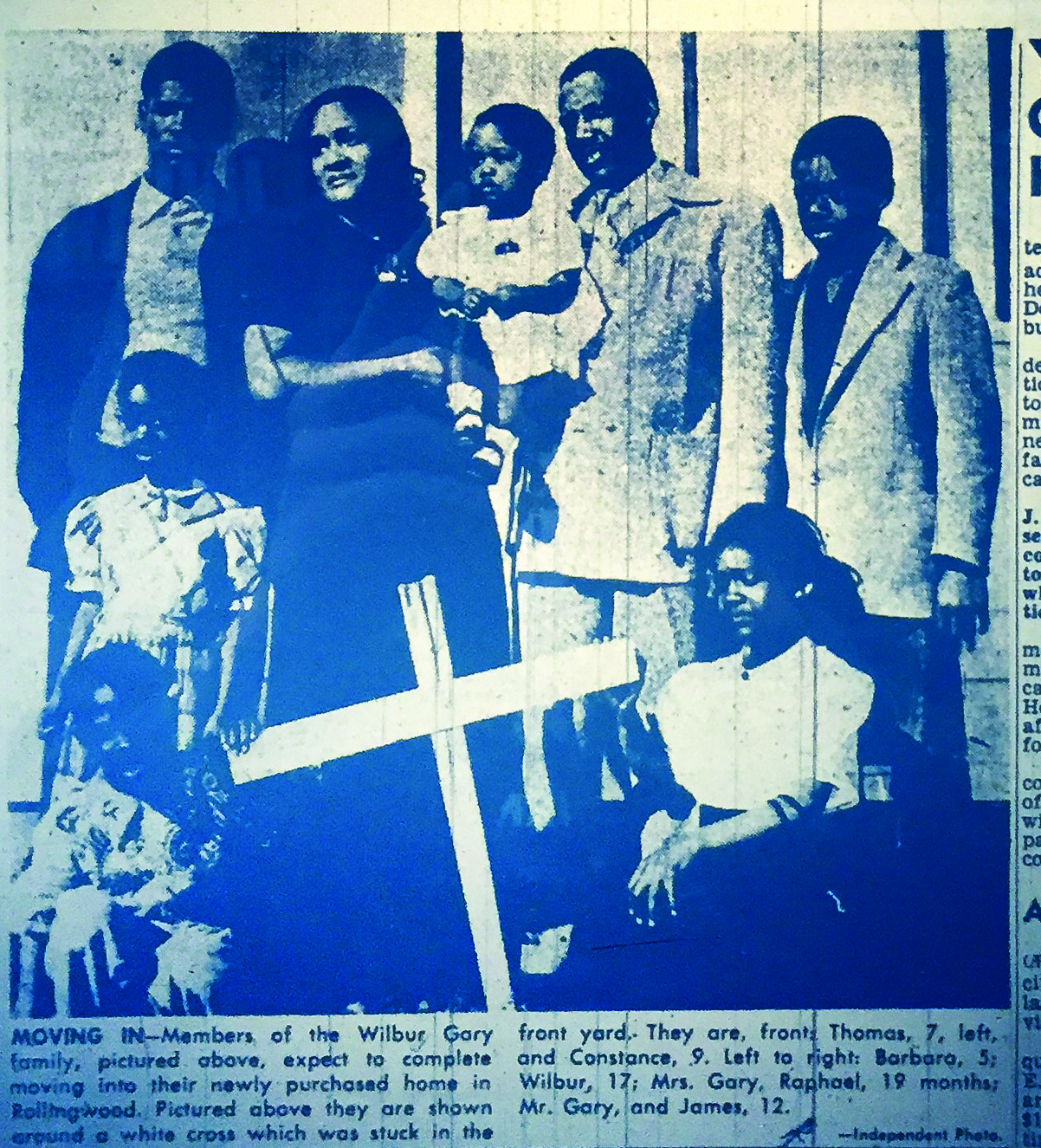 photo: The Gary family stands on their front yard at 2821 Brook Way with a white cross, a symbol the Ku Klux Klan used to terrorize them from moving into the Rollingwood subdivision in San Pablo, which historically prohibited the selling of houses to African Americans. Published in the Richmond Independent, 1952.