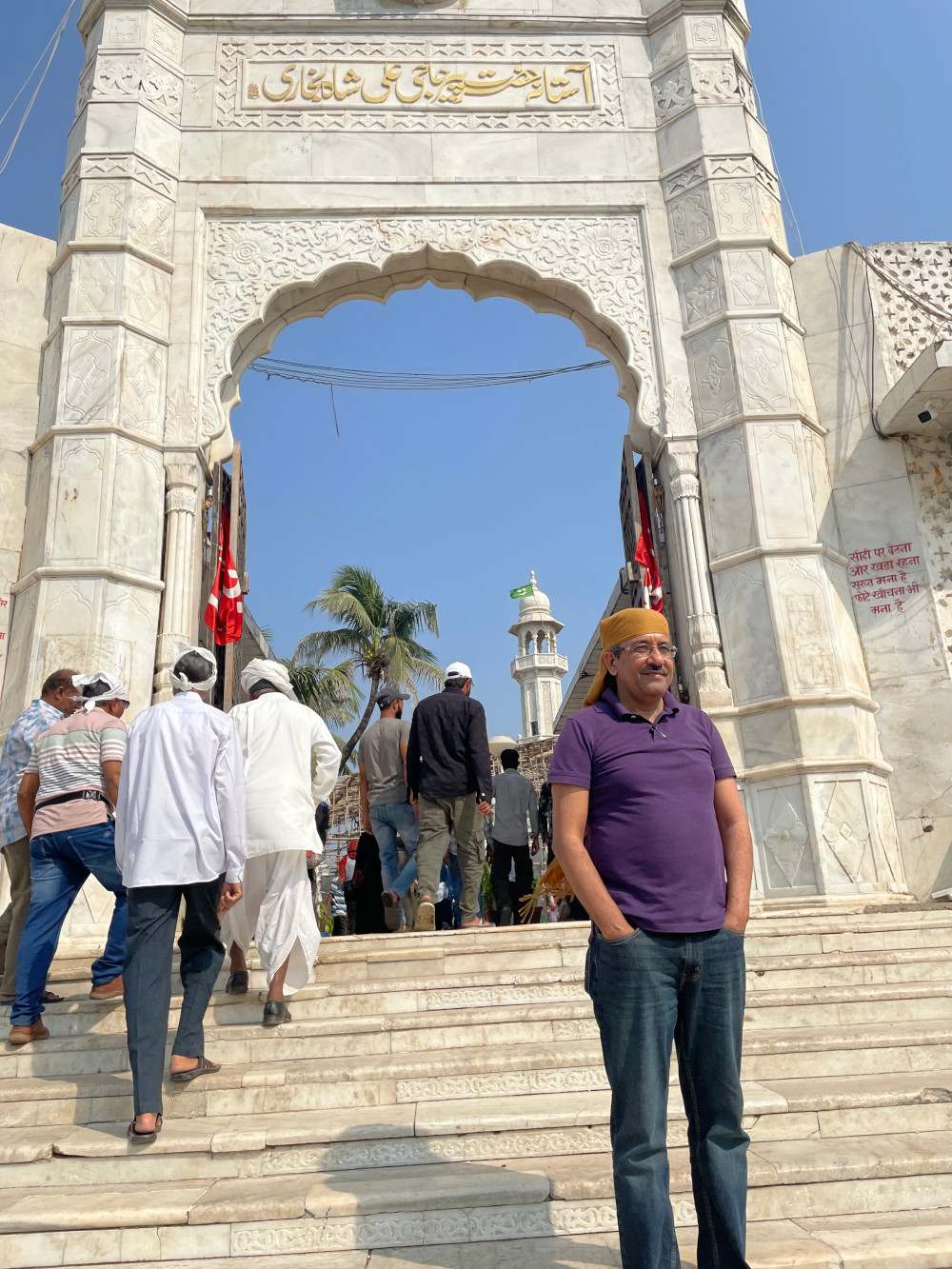 Samir pictures at the entrance to the Haji Ali Dargah and Mosque in Mumbai.