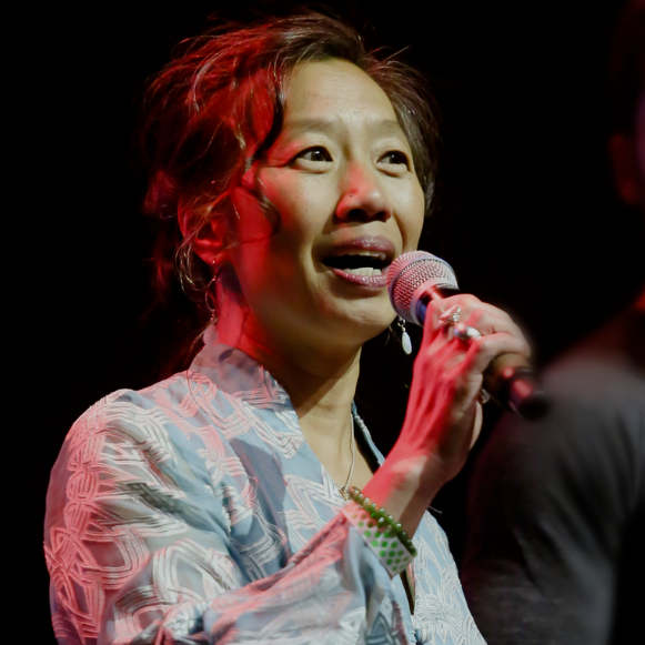 Margaretta Lin speaking on stage