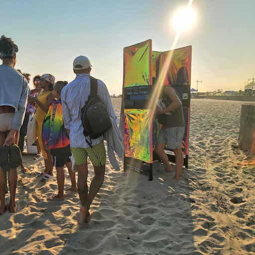 Beachgoers making an audio recording in response to a prompt