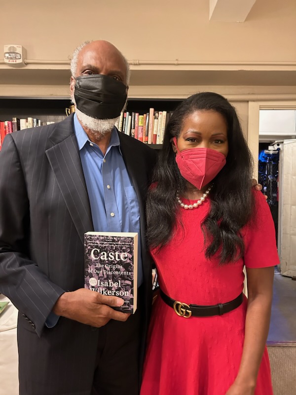 john a powell pictured with isabel wilkerson