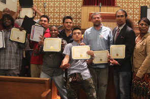 This picture includes graduates of the Safe Return Collective Impact Institute, a 10-week leadership development training series