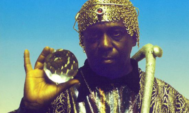 Black man holding crystal ball