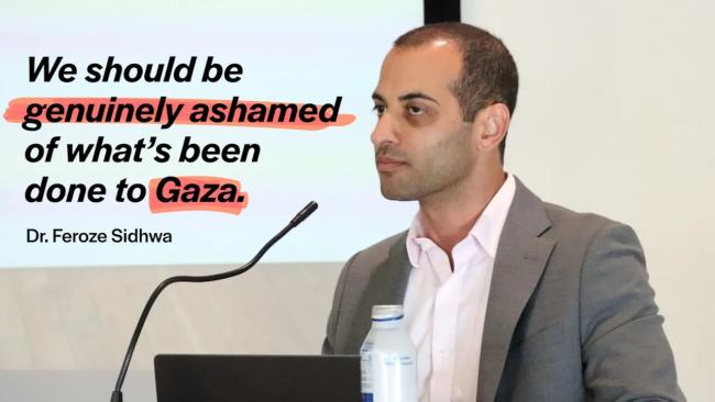 Screen grab showing Dr. Sidhwa speaking at a podium