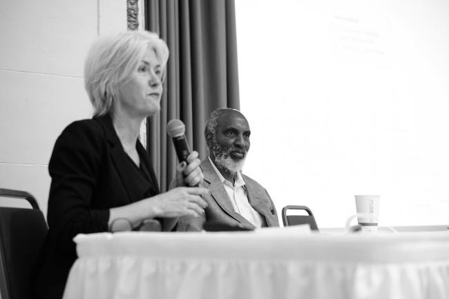 Julie Nelson and john a. powell speaking at a GARE workshop
