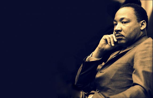 Dr. Martin Luther King reflecting.