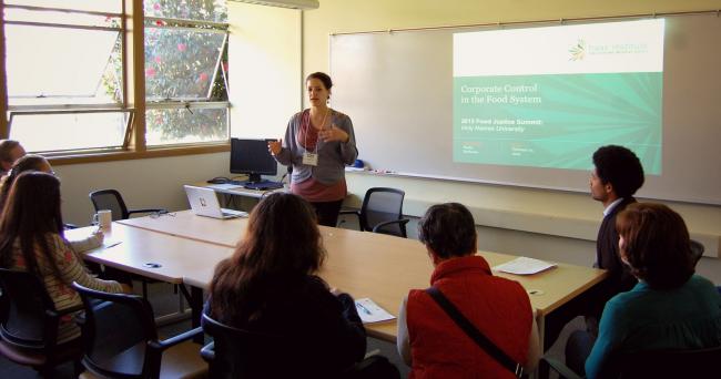 Nadia Barhoum speaking in a classroom