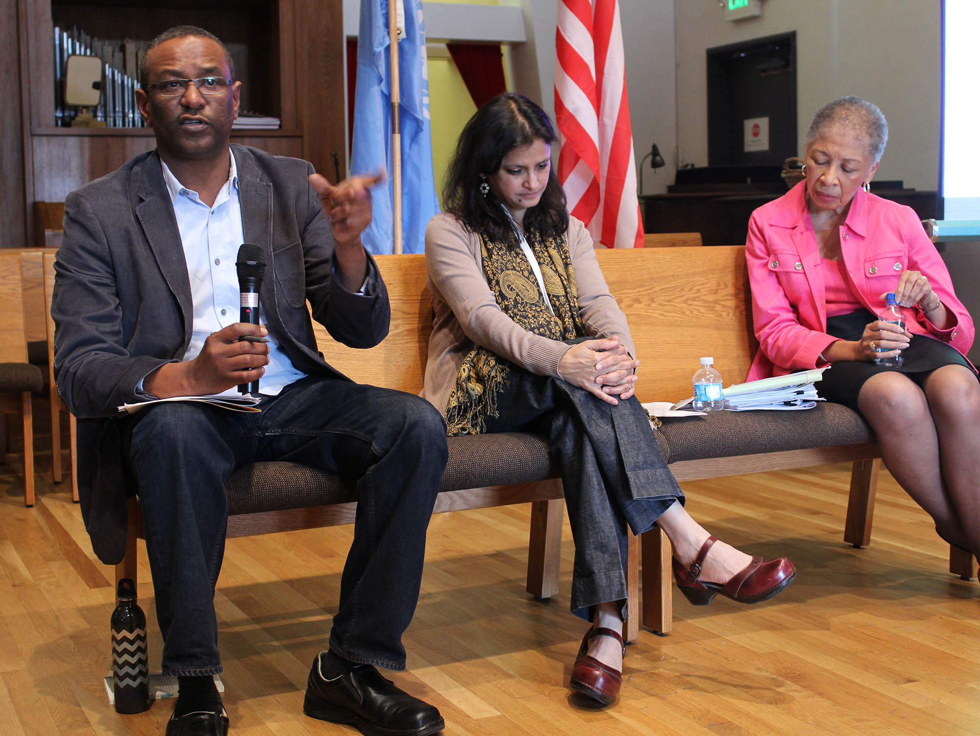 Elsadig Elsheikh, Anuradha Mittal and Julianne Cartwright Traylor at forum on food as human right in Berkeley.